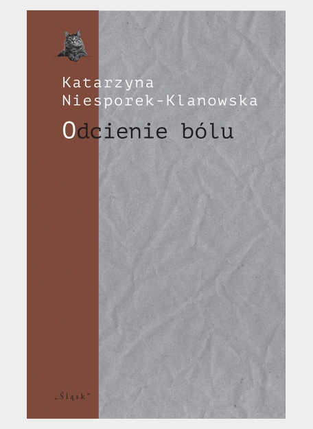 napis odcienie bólu na tle szaro-brązowym