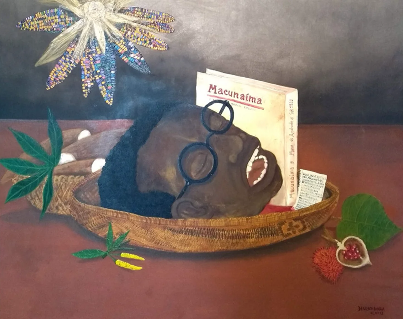 obraz autorstwa Denilsona Baniwy przedstawiający głowę czarnoskórego mężczyzny w koszu i z książką