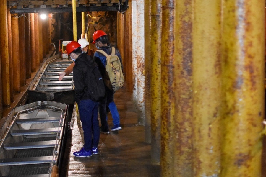 Three people in the mine