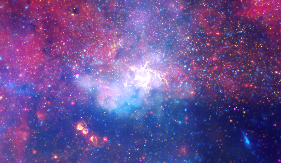 Ogromny wir gorącego gazu wskazuje przybliżoną lokalizację supermasywnej czarnej dziury Sagittarius A* w centrum Drogi Mlecznej. Obraz w podczerwieni uchwycony przez Kosmiczny Teleskop Hubble’a | fot. NASA, ESA, SSC, CXC, STScI