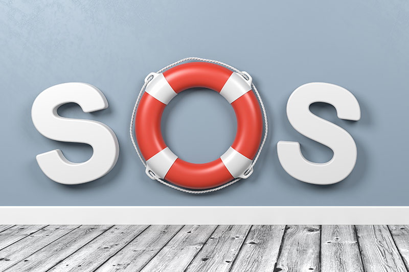 Napis SOS, jako litera "O" – koło ratunkowe