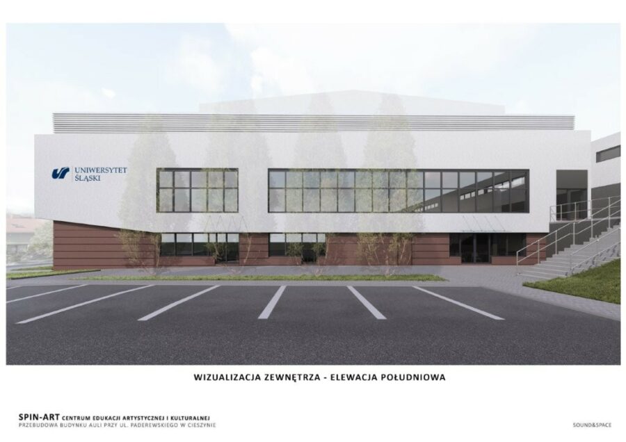 Widok południowej elewacji nowoczesnego dwupietrowego budynku z elewację w jasnym i brązowym kolorze, dużymi oknami i logo Uniwersytetu Śląskiego na ścianie. Przed budynkiem parking, drzewa iglaste oraz zewnętrzne schody. Widok południowej elewacji nowoczesnego dwupietrowego budynku z elewację w jasnym i brązowym kolorze, dużymi oknami i logo Uniwersytetu Śląskiego na ścianie. Przed budynkiem parking, drzewa iglaste oraz zewnętrzne schody.